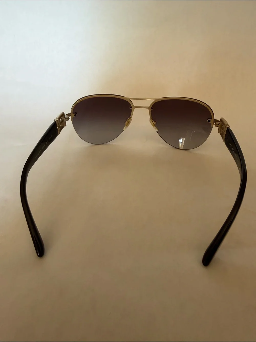 Versace Gold Frame Sunglasses with Brown Gradient Lenses and Black Temples